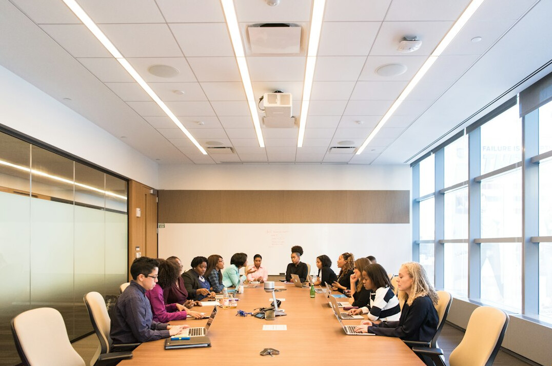 corporate team in meeting room