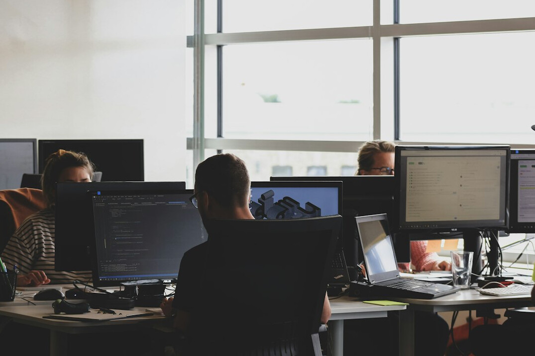 corporate programmers collaborating
