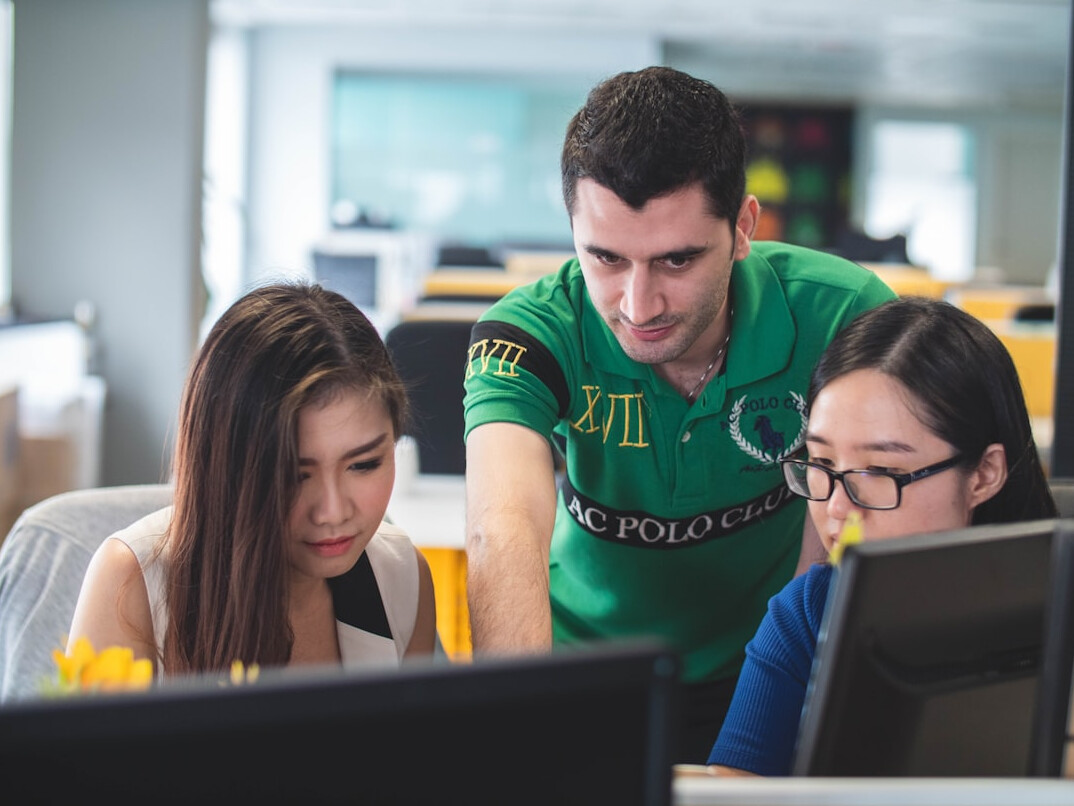 team reviewing code security